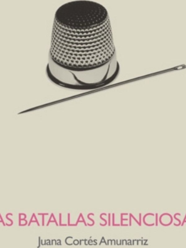 Un dedal y una aguja, símbolos de costura y creatividad.