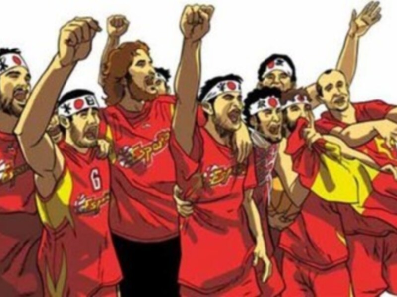 Un grupo de jugadores de fútbol celebrando, todos con camisetas rojas y banderas en la cabeza.