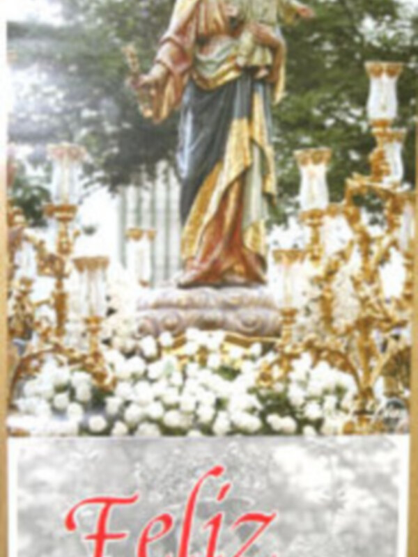Feliz 2009. Imagen de una estatua religiosa con un niño en sus brazos, rodeada por flores y luces doradas.