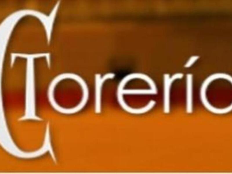 "Torería" en letras blancas sobre un fondo naranja.