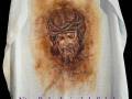 Tela con dibujo de Jesús con corona de espinas y el nombre "Ntro. Padre Jesús de la Salud".