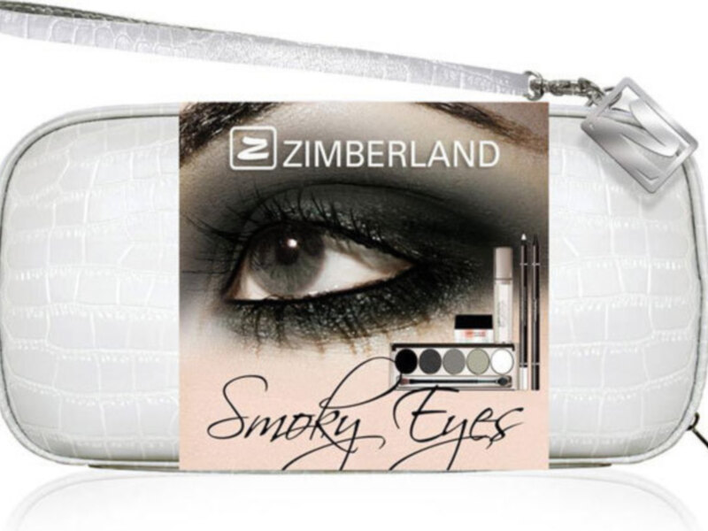 Zimmerland Smoky Eyes maquillaje con una imagen de ojo con sombra negra y un bolso blanco con diseño de cuero.