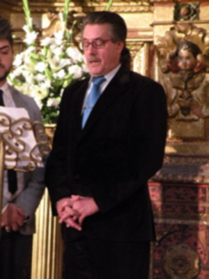 Provincia.El Profesor e Historiador D. Manuel Morales Morales, pronuncio una disertación, sobre el canto de la Sentencia de Pilatos en la Hermandad de Jesús Nazareno de Alcalá del Río.