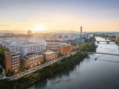 Recreación del Complejo Vera Sevilla junto al río, donde el Grupo EULEN ha instalado su nueva sede.